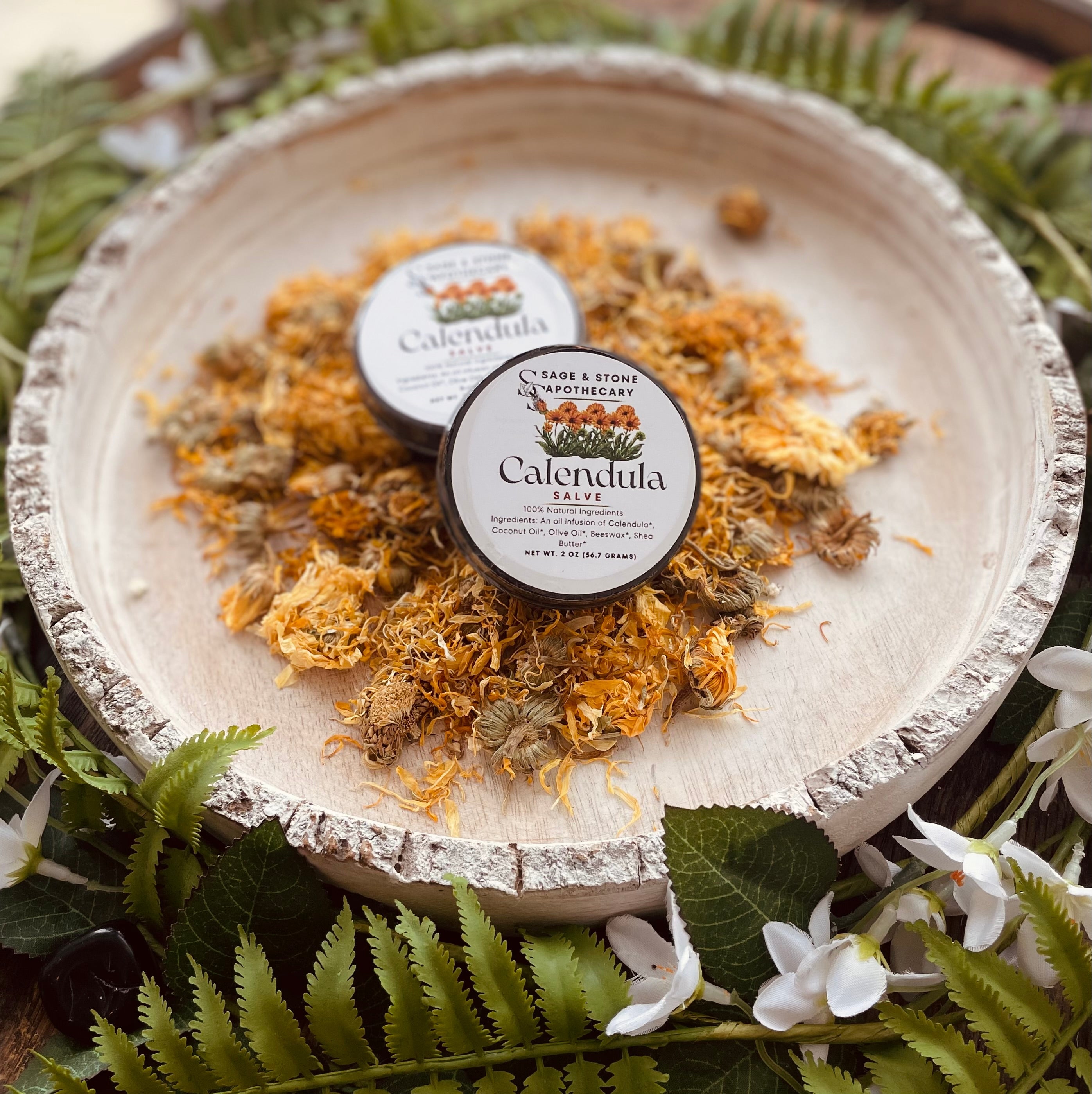Sage & Stone Apothecary Calendula Salve in a glass jar, natural personal care salve with calendula flowers, for skin soothing.