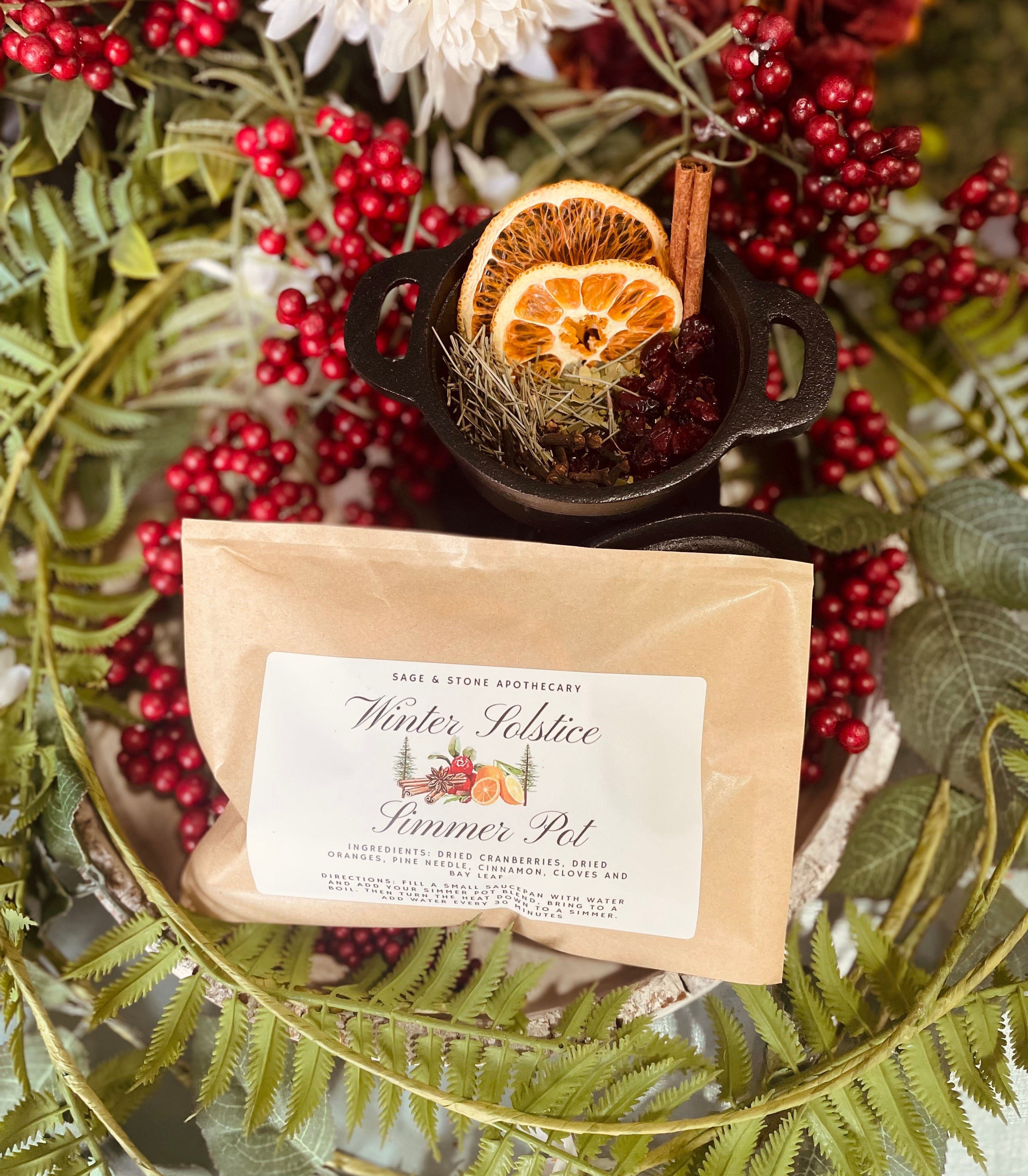 Winter Solstice Simmer Pot by Sage & Stone Apothecary, featuring aromatic herbs and seasonal ingredients in a cozy simmer pot.