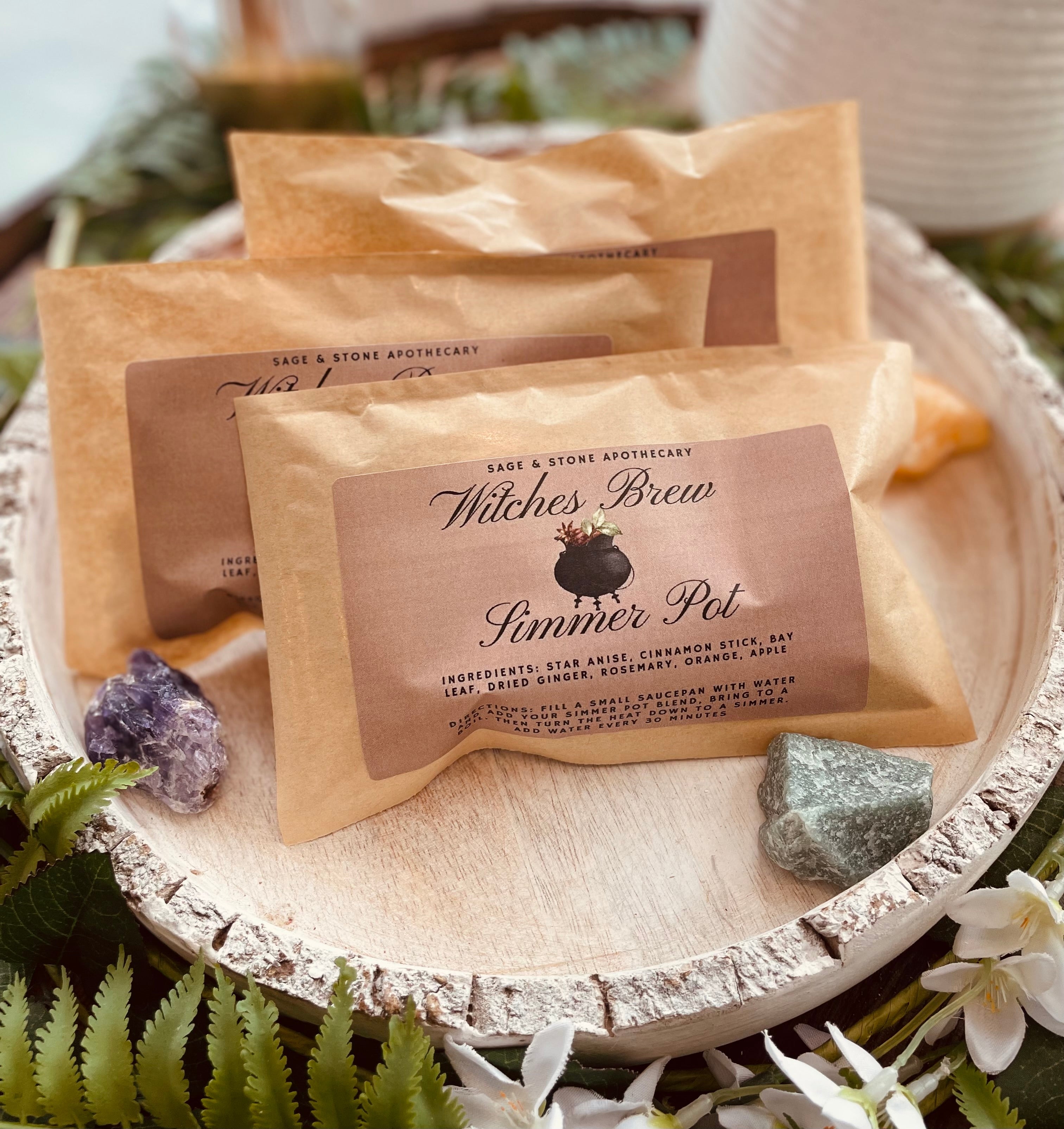Sage & Stone Apothecary Witches Brew Simmer Pot with bubbling herbs and mystical design, perfect for magical home fragrances.