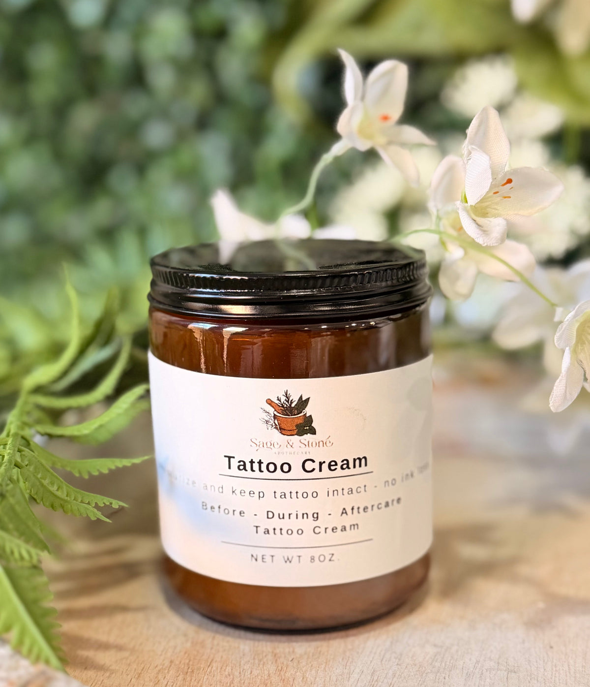 Sage & Stone Apothecary tattoo cream jar with natural ingredients, designed to soothe and nourish skin during tattoo healing.