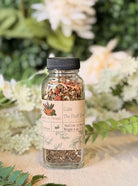 Sage & Stone Apothecary Calm the Fluff Down herbal tea in a 4 oz package, featuring a calming blend of herbs for relaxation.