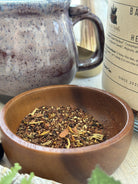 Sage & Stone Apothecary Banana Nut Bread tea in a teacup, featuring warm nutty and banana flavor with a comforting aroma.