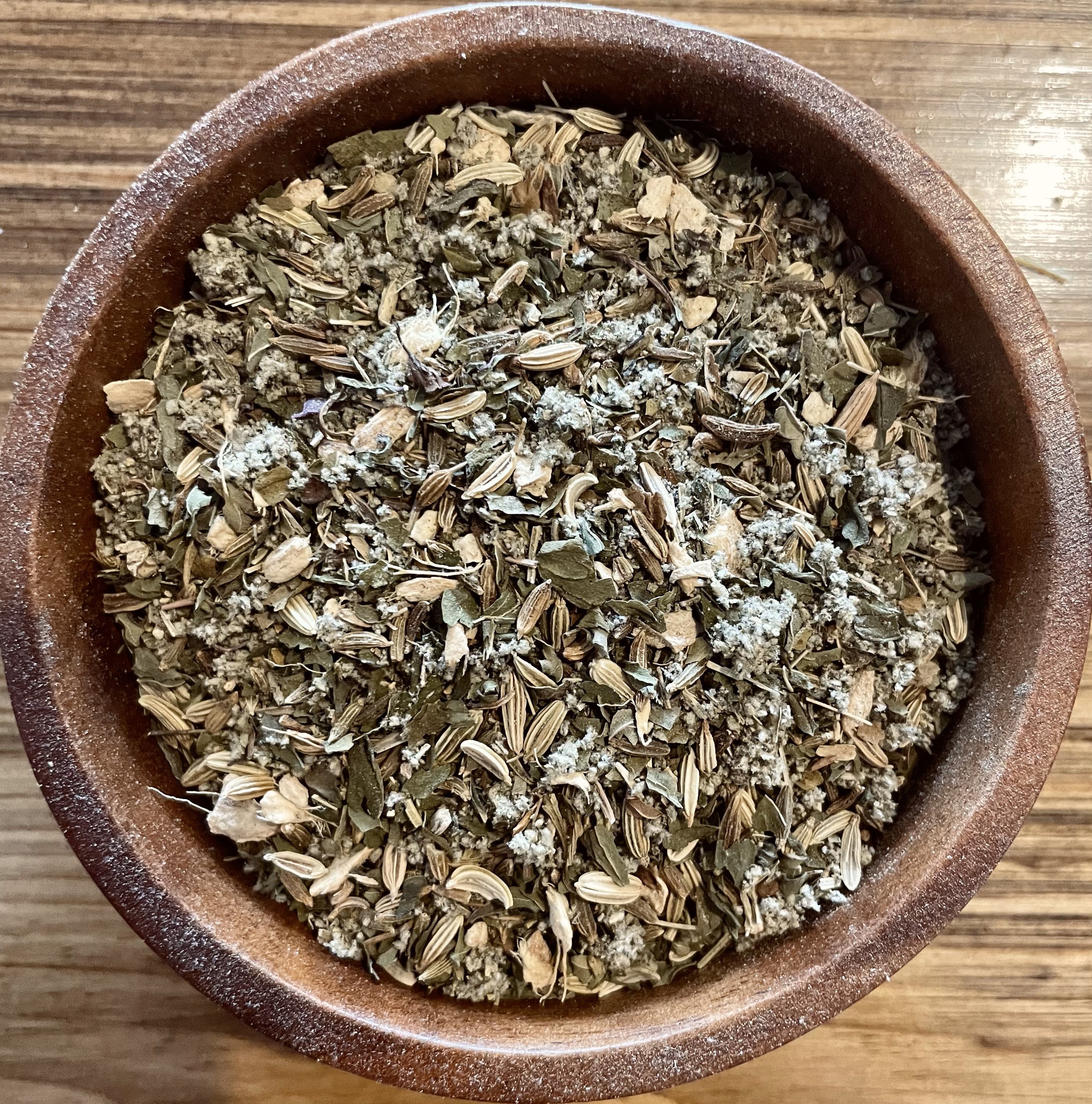 Sage & Stone Apothecary Belly Ache herbal tea in a 1.5 oz package, featuring calming botanical blend for digestive relief.