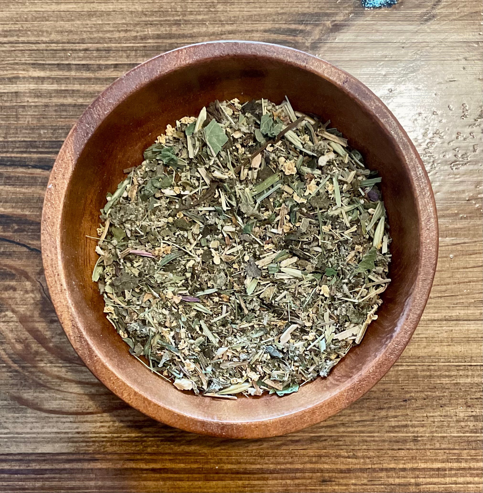 Sage & Stone Apothecary Flashes Tea in a glass jar with loose tea leaves, showcasing natural herbal tea ingredients.