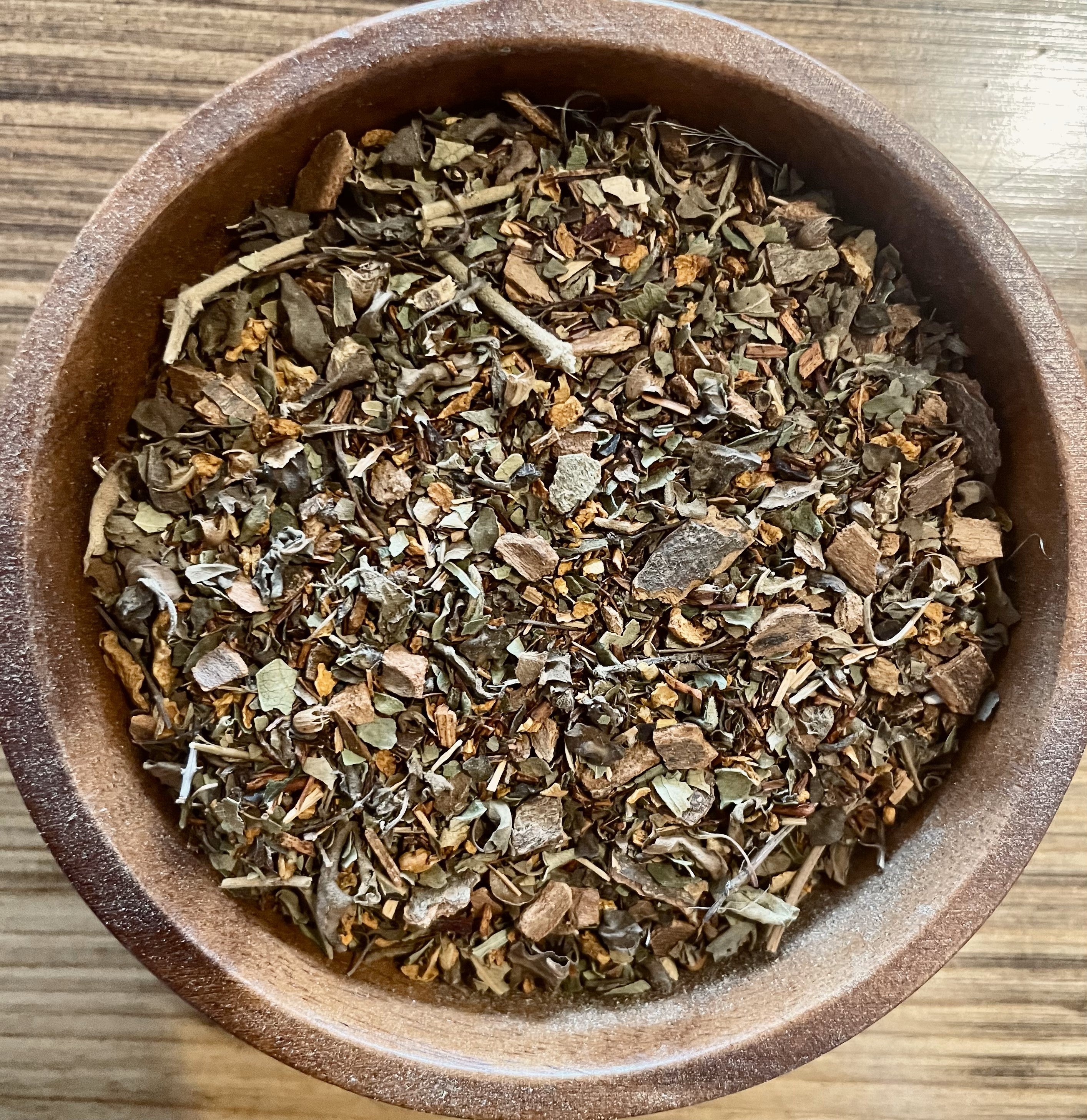Sage & Stone Apothecary Slim Tummy Herbal Tea in a 1.5 oz package, featuring a blend of herbs for digestive support.