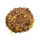 Box of Sage & Stone Apothecary Strawberry Hibiscus tea featuring dried strawberries and hibiscus flowers in a natural setting.