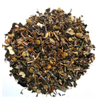 Herbal tea blend for stress relief by Sage & Stone Apothecary, featuring dried herbs and botanicals in a clear tea bag.