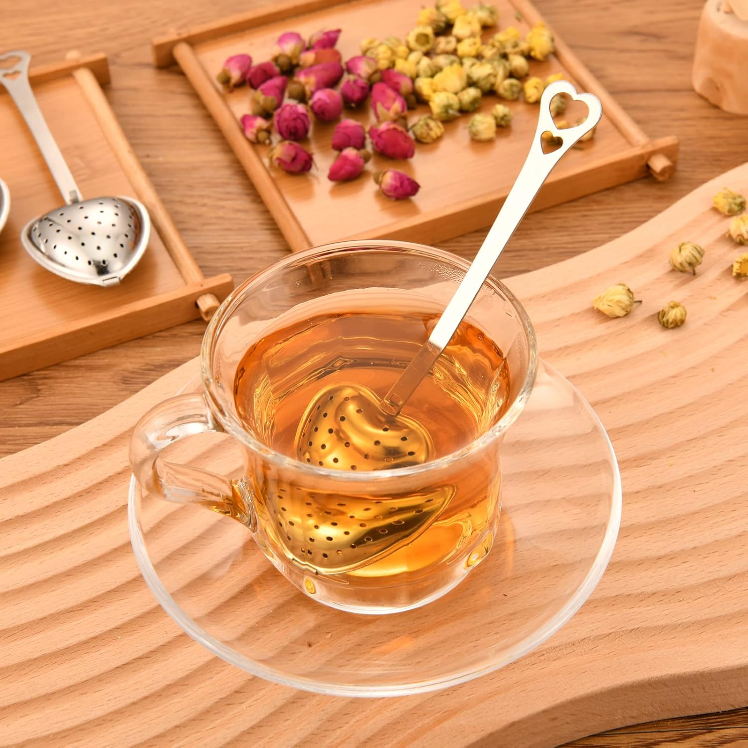 Heart-shaped tea infuser from Sage & Stone Apothecary, perfect for brewing loose leaf tea in your kitchen.