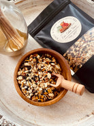 Sage & Stone Apothecary Fire Cider Tonic DIY kit for immune support, featuring bottles, herbs, and ingredients in a wellness setup.