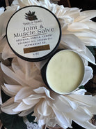 Sage & Stone Apothecary joint and muscle salve jar with herbal ingredients, designed for wellness and soothing muscle relief.