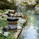 Spiritual bath with Dead Sea salts for purification, featuring natural elements and calming atmosphere by Shamans Dawn.