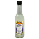 Shamans Dawn Florida Water spray bottle with a silhouette design, featuring a clear glass container and white spray nozzle.