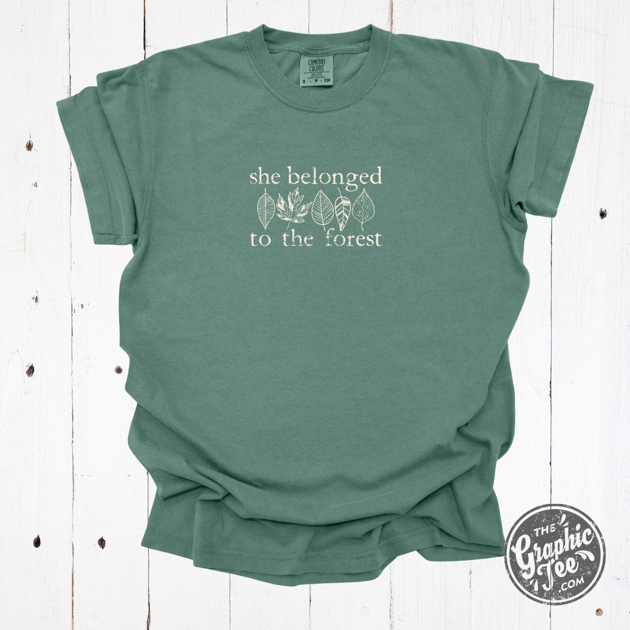 Emerald green Comfort Colors short sleeve graphic tee featuring forest-themed design by The Graphic Tee.