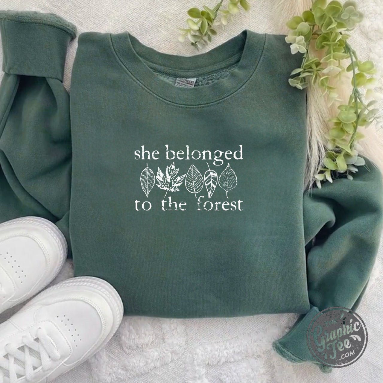 Alpine green crewneck sweatshirt by The Graphic Tee featuring pigment-dyed forest-themed graphic design.
