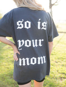 Black graphic T-shirt featuring bold "Tattoos are Trashy" design from Shop Karma Tees, displayed flat on a surface.
