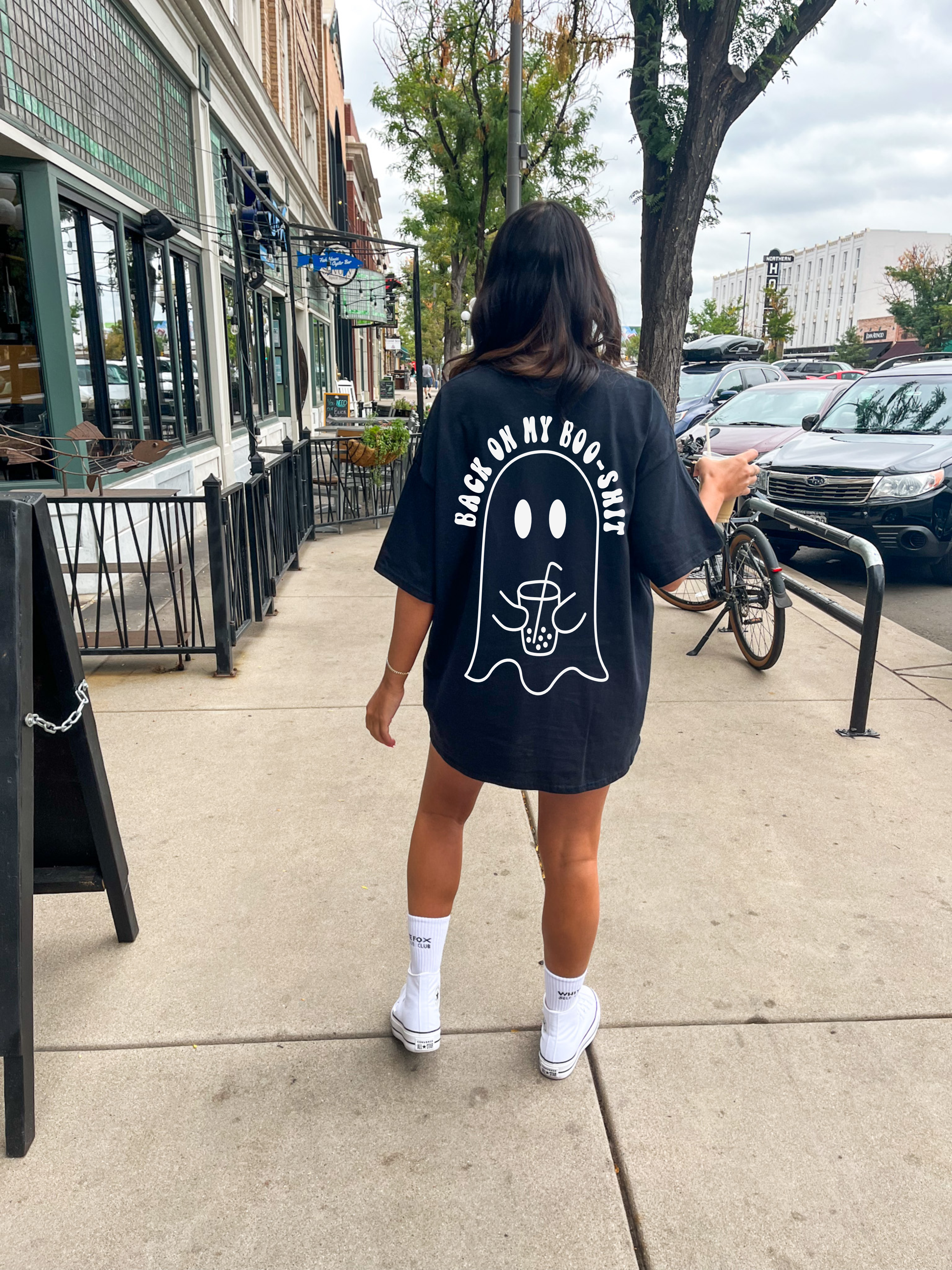 Black graphic tee from Shop Karma Tees featuring bold "Back on my Boo Shit" print on the back. Casual streetwear style.