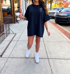 Black graphic t-shirt from Shop Karma Tees with bold "Back on my Boo Shit" print, casual fit, and soft cotton fabric.