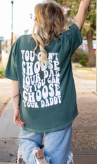 White graphic T-shirt from Shop Karma Tees with "Choose Your Daddy" design, casual fit and bold printed text.