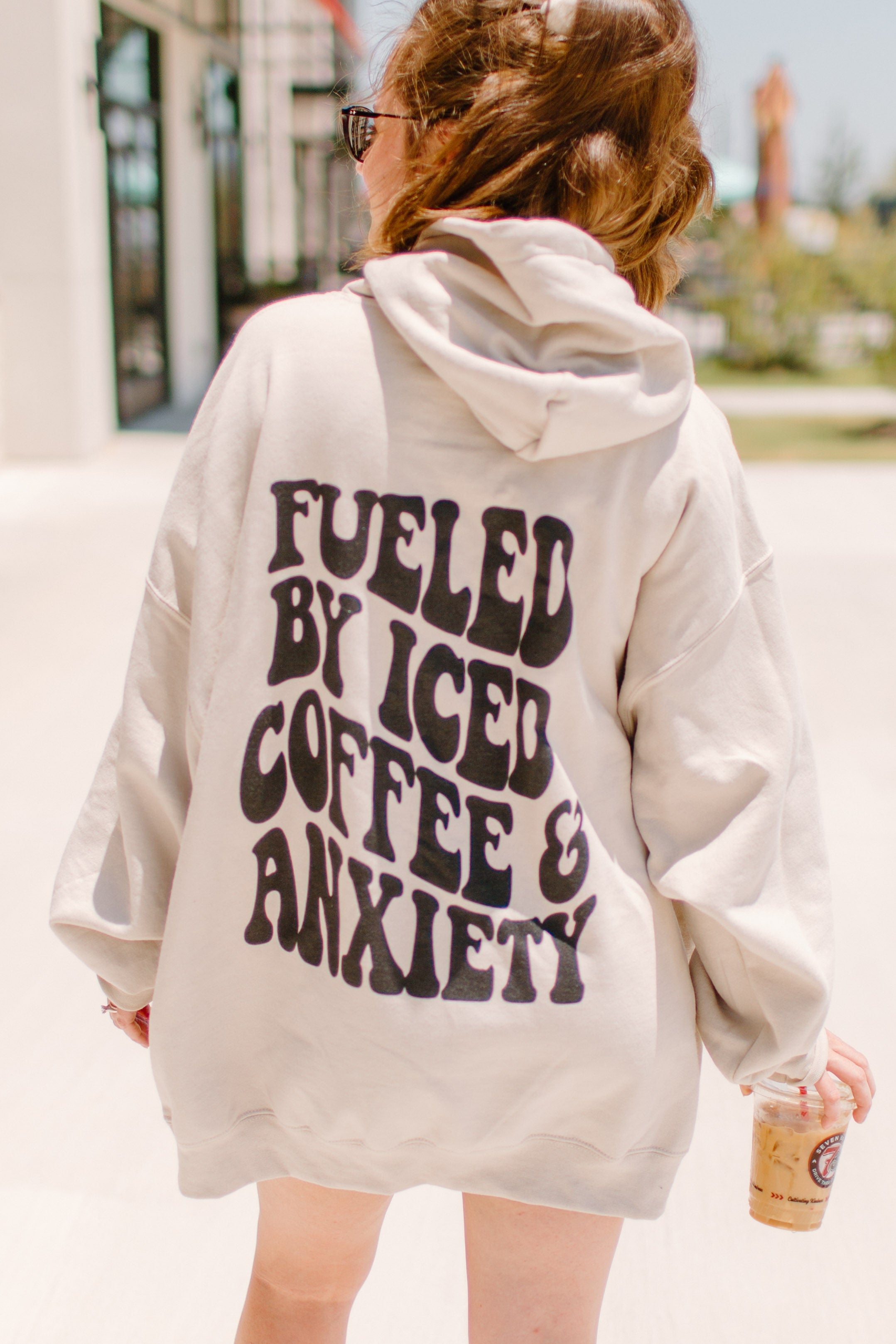 Coffee and Anxiety graphic sweatshirt by Shop Karma Tees featuring a stylish design on a comfortable sweatshirt.