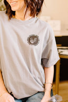 Black graphic tee featuring the phrase "I Have More Tattoos Than I Do Friends" from Shop Karma Tees, casual and stylish unisex shirt.