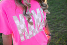 Mama checkered graphic T-shirt from Shop Karma Tees featuring a bold checkered design on soft cotton fabric.