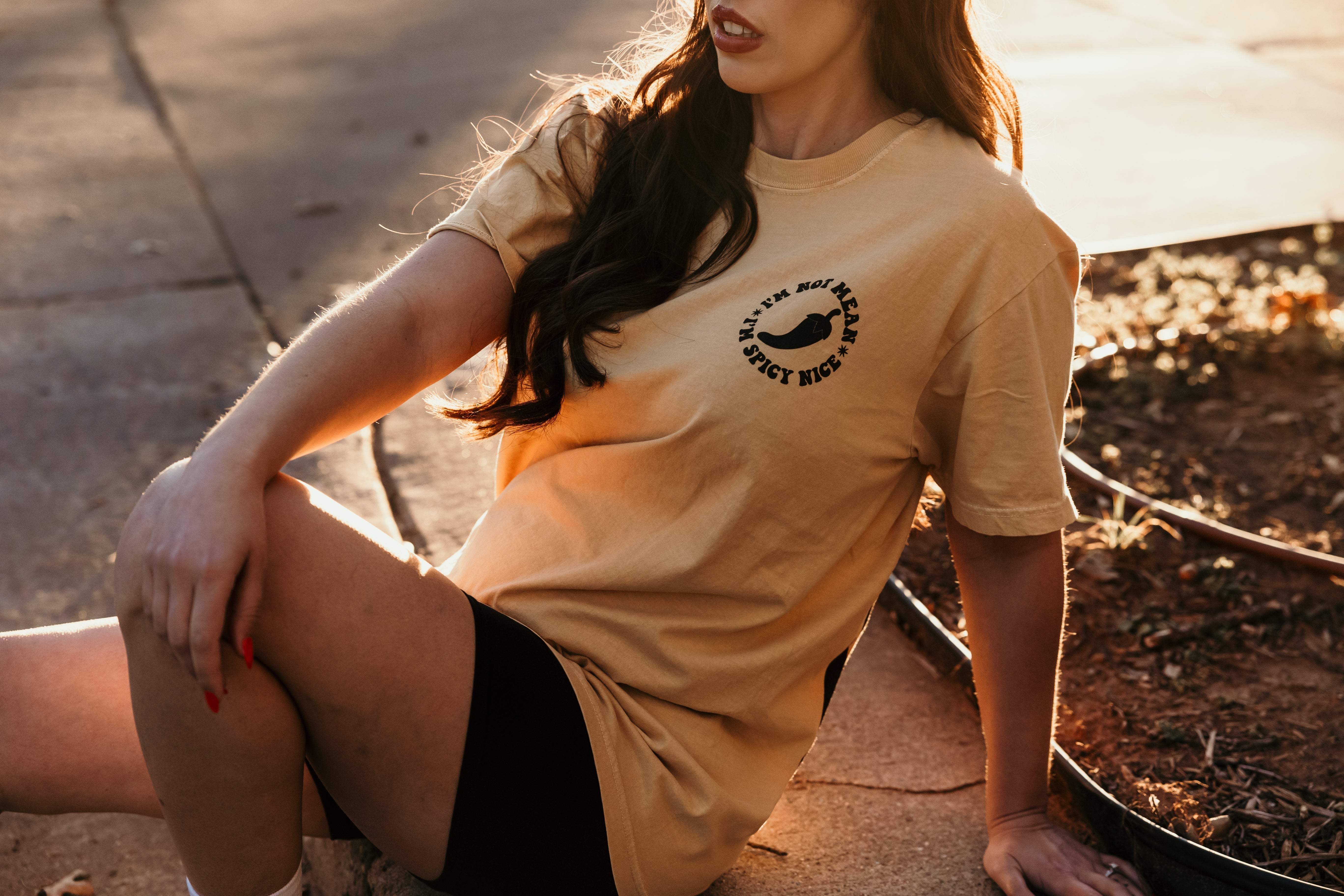 Spicy Nice graphic t-shirt by Shop Karma Tees featuring bold lettering and colorful design on a casual cotton tee.
