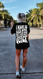 Black cotton graphic t-shirt from Shop Karma Tees featuring "I Might Be Laid Back" slogan and relaxed fit.