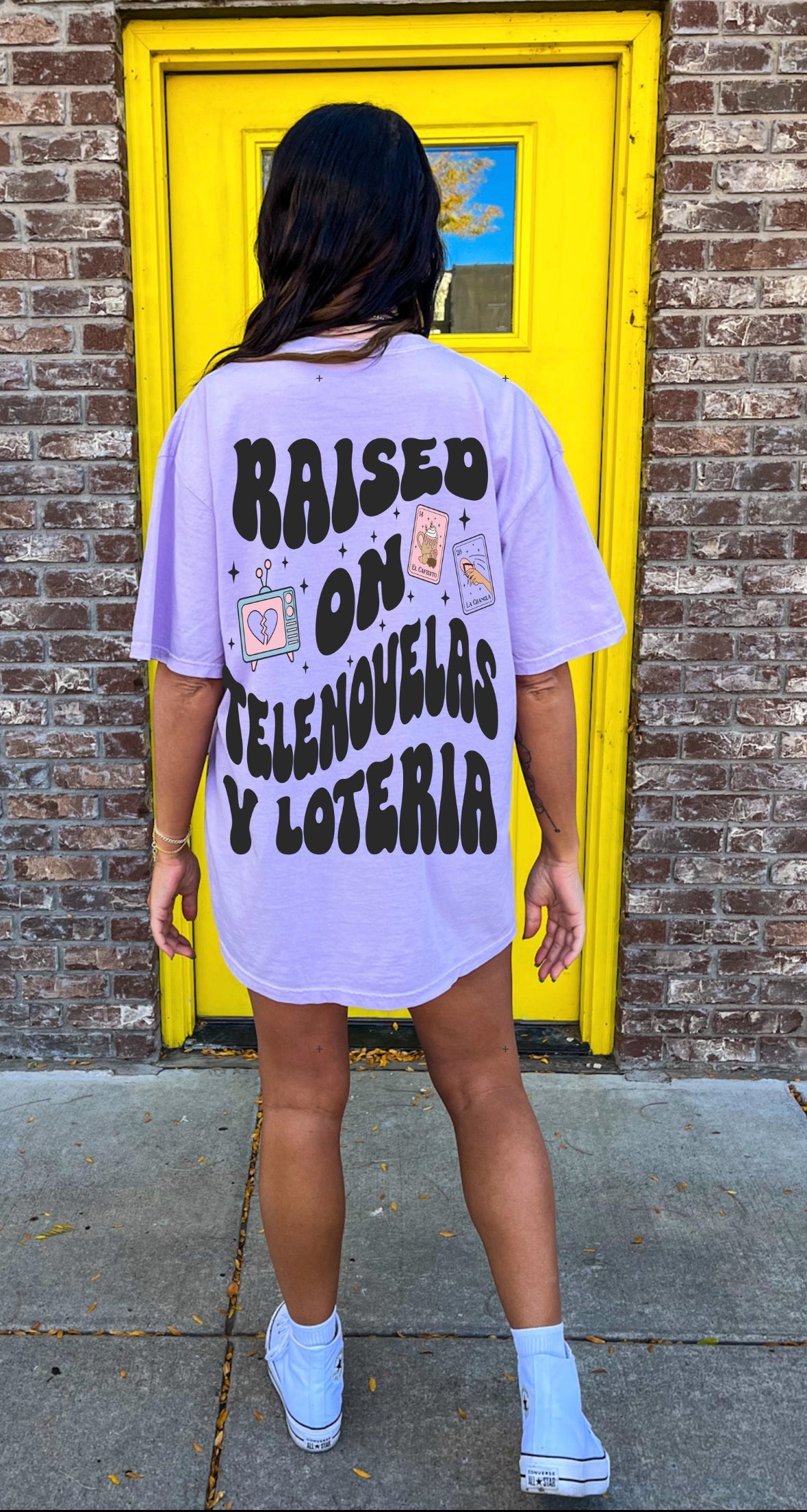Loteria graphic T-shirt by Shop Karma Tees featuring colorful Loteria card artwork on a casual cotton tee.