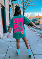 Moody with a Booty graphic T-shirt from Shop Karma Tees featuring a bold, colorful design on soft cotton fabric.