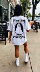 Men's Ghosting Pendejos graphic T-shirt featuring bold text and design, displayed on a plain background.
