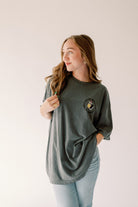 Spicy Books graphic T-shirt from Shop Karma Tees featuring bold printed design on a casual cotton tee.