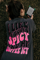 Spicy Books graphic T-shirt by Shop Karma Tees featuring bold printed design on soft cotton fabric.