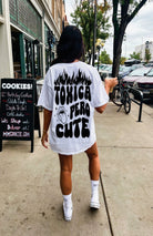 Toxica Pero Cute graphic T-shirt by Shop Karma Tees featuring a colorful, playful design on a black fabric background.
