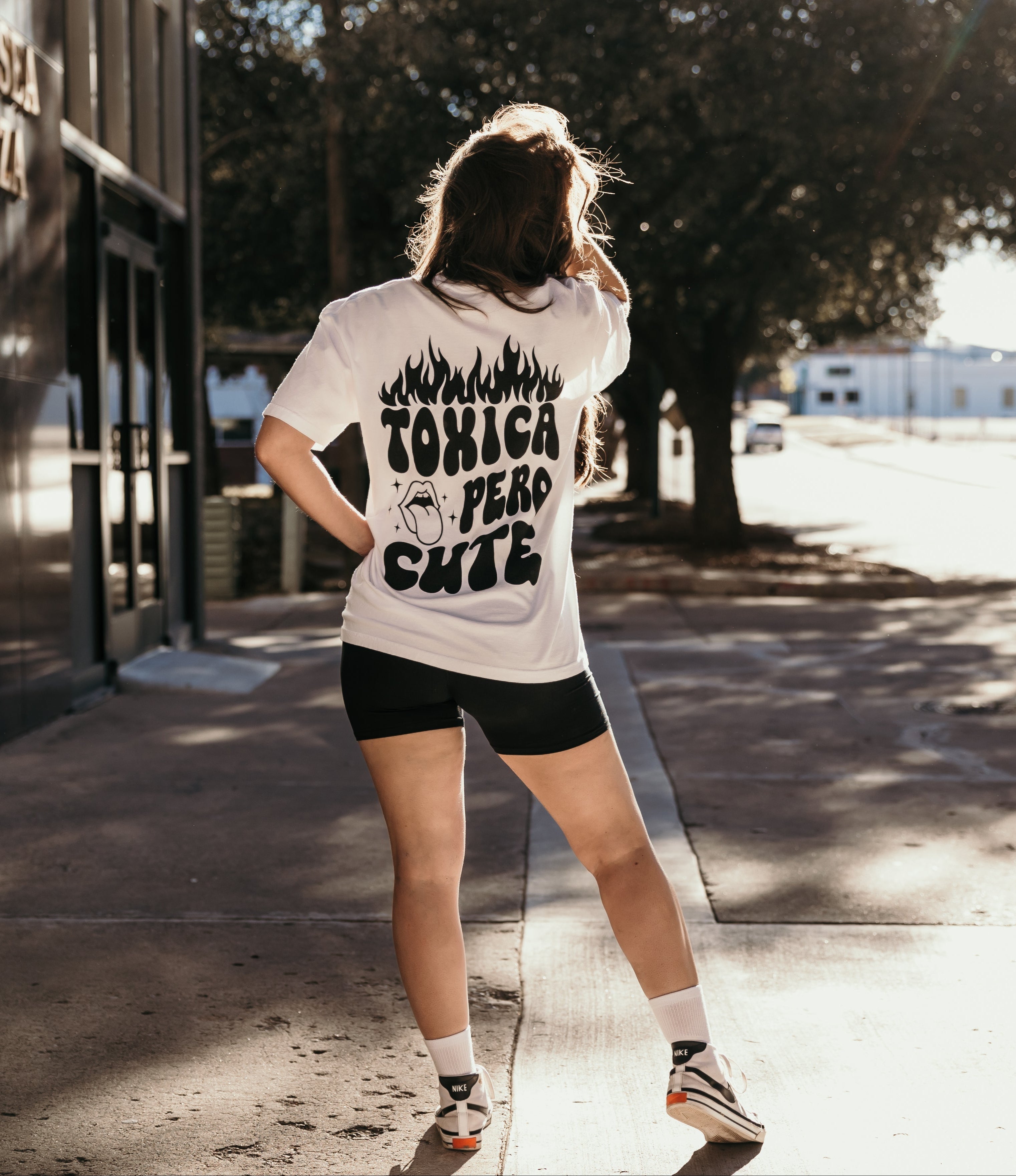Colorful Toxica Pero Cute graphic T-shirt by Shop Karma Tees, featuring vibrant design on soft fabric.