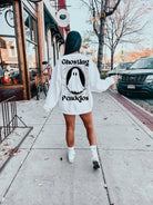 Ghosting Pendejos Pullover by Shop Karma Tees, close-up of the black crewneck sweatshirt with the printed design visible.