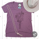 Simply Floral ladies' cut hi-low scoop neck graphic tee by The Graphic Tee, featuring floral design and casual style.