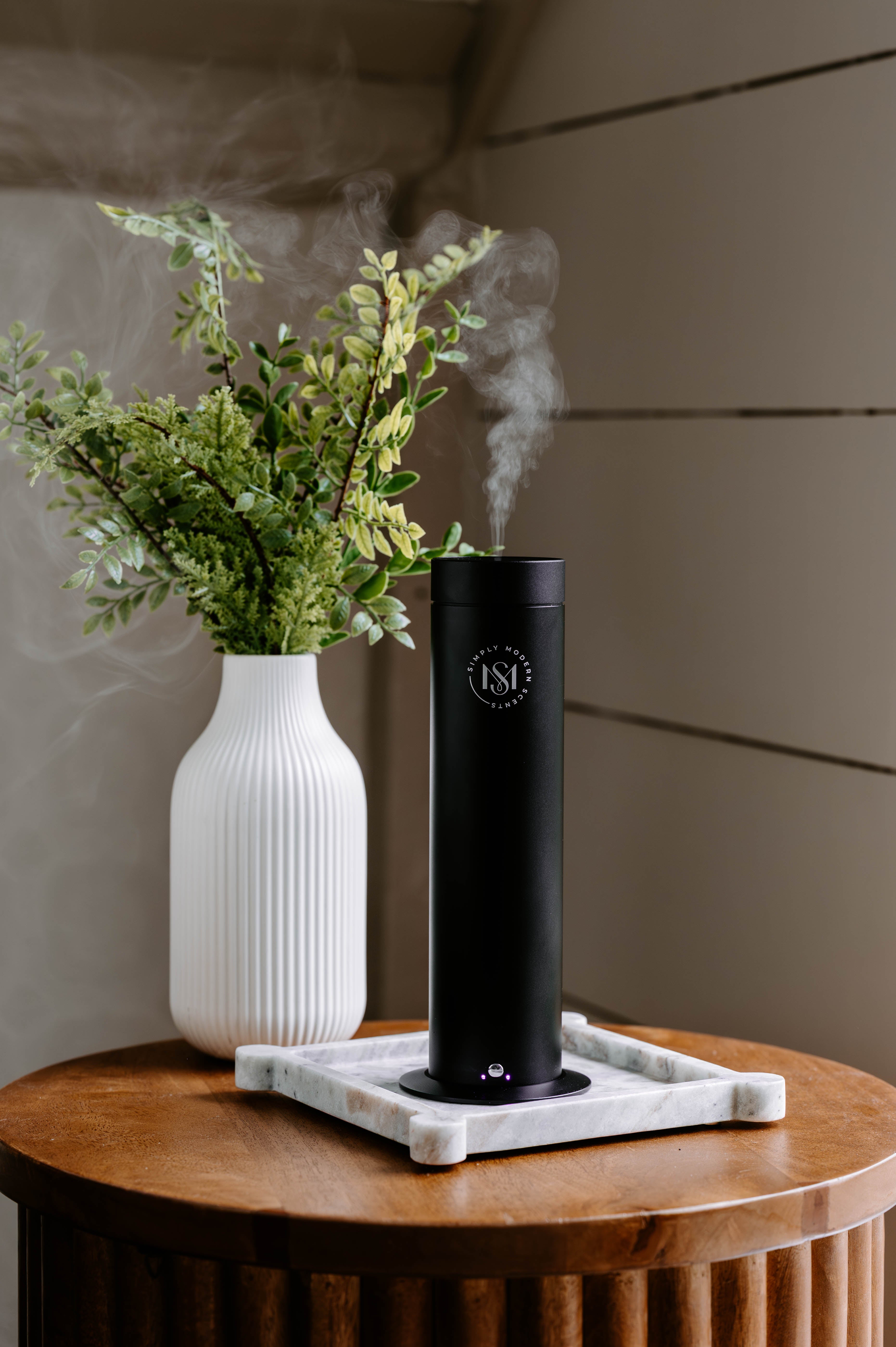 Luxury electric home diffuser by Simply Modern Scents with a 2 oz diffuser oil, designed for elegant room fragrance.
