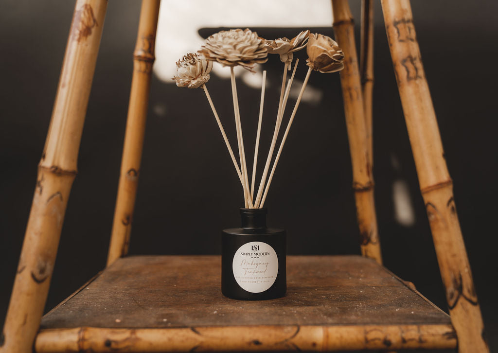 Handmade floral reeds for Simply Modern Scents home diffuser, featuring decorative natural reed sticks and floral accents.