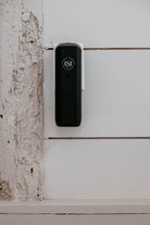 Luxury electric home diffuser by Simply Modern Scents with a sleek design, shown with a 2 oz diffuser oil.