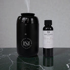 Luxury car diffuser from Simply Modern Scents with a 2 oz diffuser oil, designed to enhance your vehicle's interior scent.