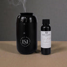 Luxury car diffuser from Simply Modern Scents with a 2 oz diffuser oil bottle, designed for stylish vehicle scenting.