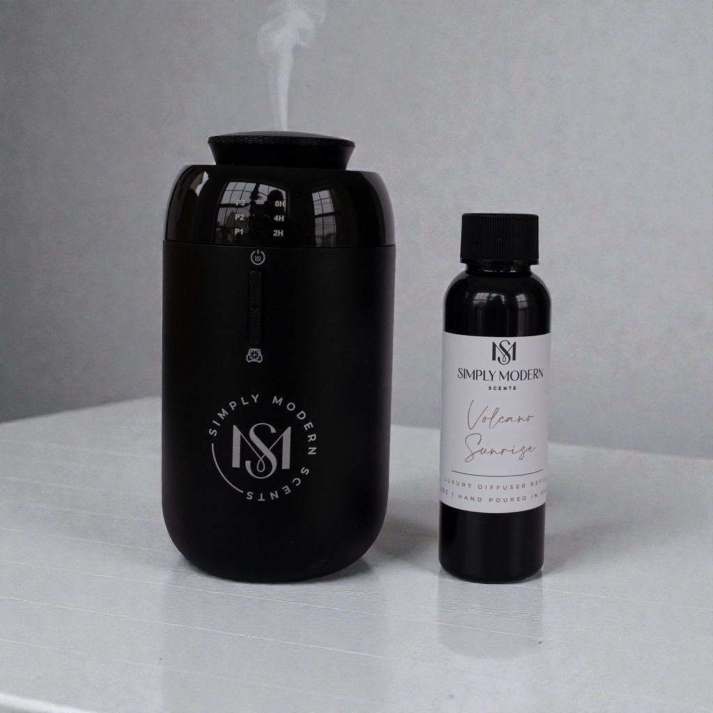 Luxury car diffuser from Simply Modern Scents with free 2 oz diffuser oil, designed to enhance vehicle interior fragrance.