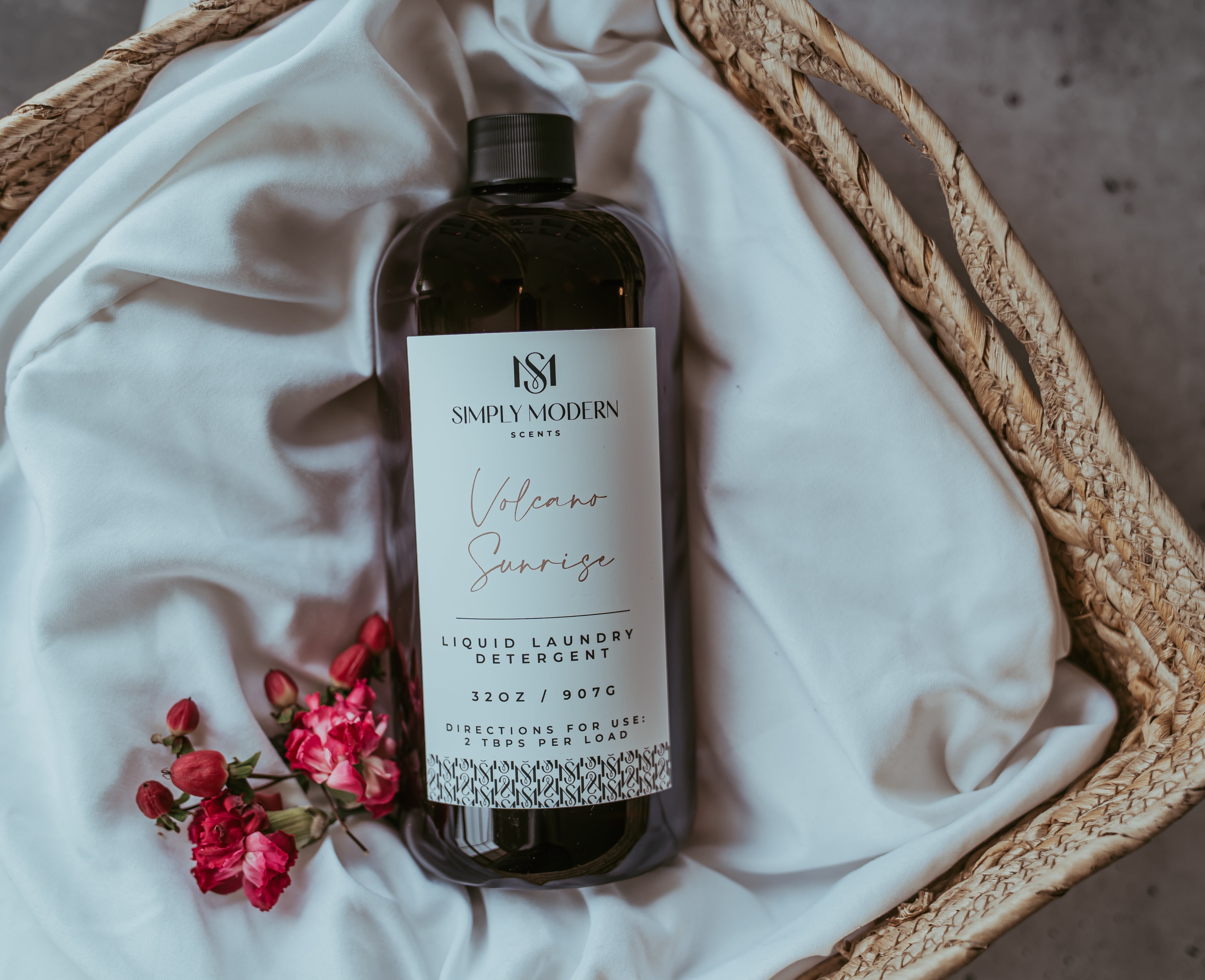 Simply Modern Scents Midnight Tide 32oz luxury laundry detergent bottle with a sleek label for fresh, clean clothes.