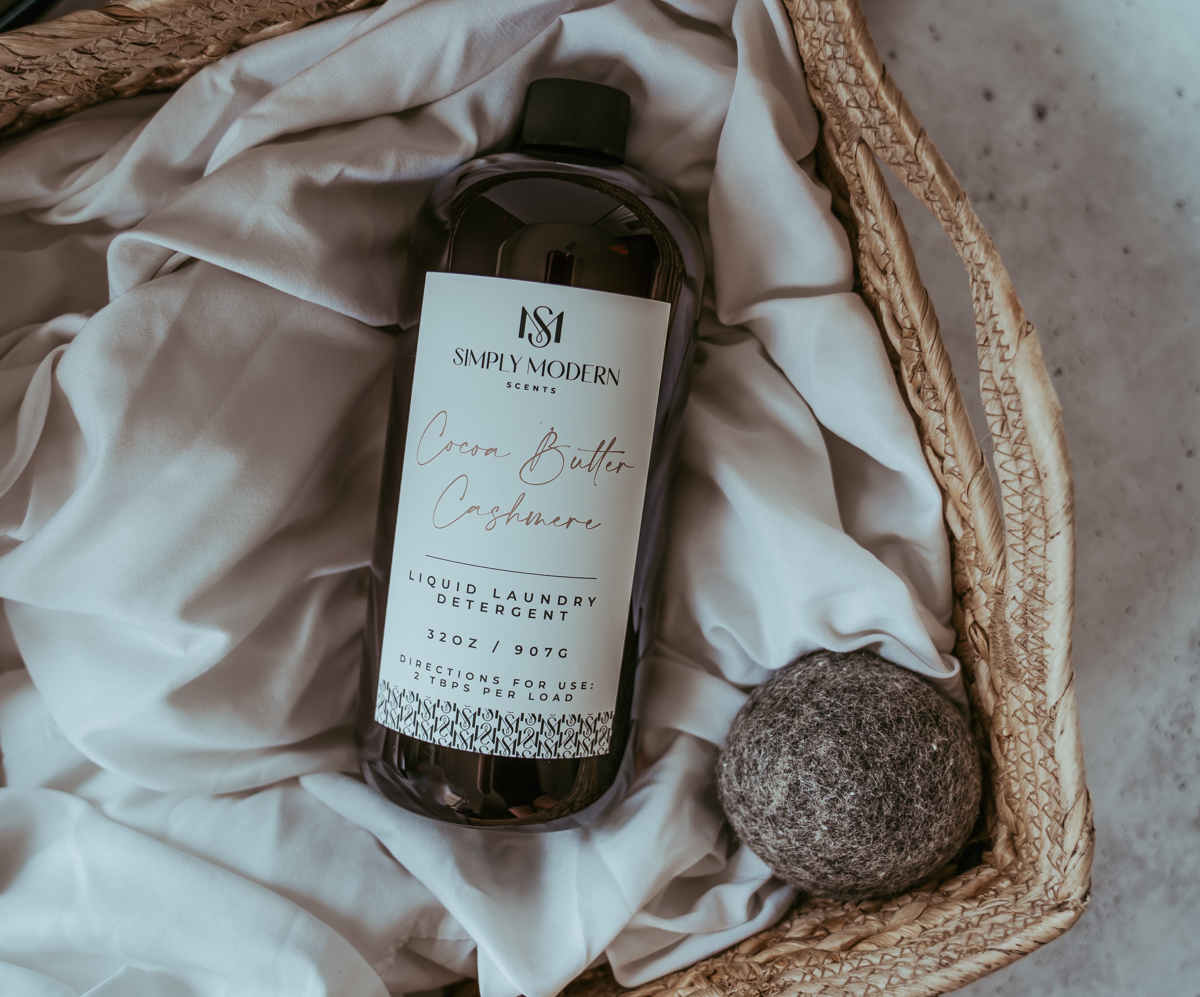 Simply Modern Scents Midnight Tide 32oz luxury laundry detergent bottle with clean label and minimalist design