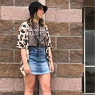 Black short-sleeve graphic T-shirt featuring "Smooth As Tennessee Whiskey" print from The Graphic Tee.