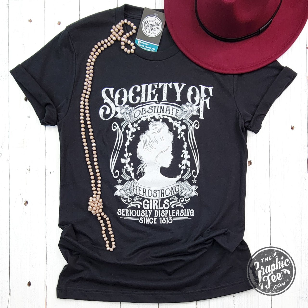 Society of Obstinate Headstrong Girls short sleeve crew neck graphic tee by The Graphic Tee, featuring bold printed design.