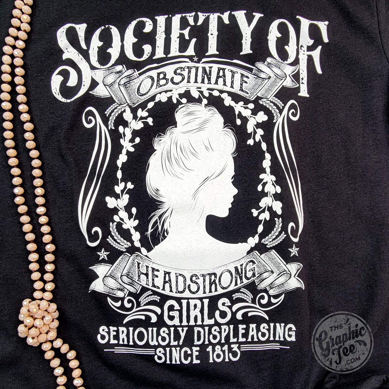 Society of Obstinate Headstrong Girls short sleeve crew neck graphic tee by The Graphic Tee, featuring bold printed design.
