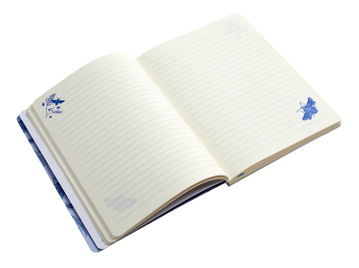 Softcover Art of Nature Flight of Beetles notebook by Insight Editions with elastic band and detailed beetle illustrations.