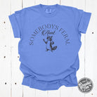 Somebody's Feral Aunt graphic T-shirt in pigment dye, featuring a casual short-sleeve design with bold print on the front.