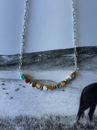 Spiny oyster turquoise beaded chain necklace by Wild Junkie featuring vibrant, handcrafted beads on a delicate chain.